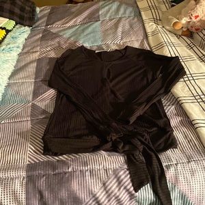 Lightweight, ribbed  sweater with tie at waist